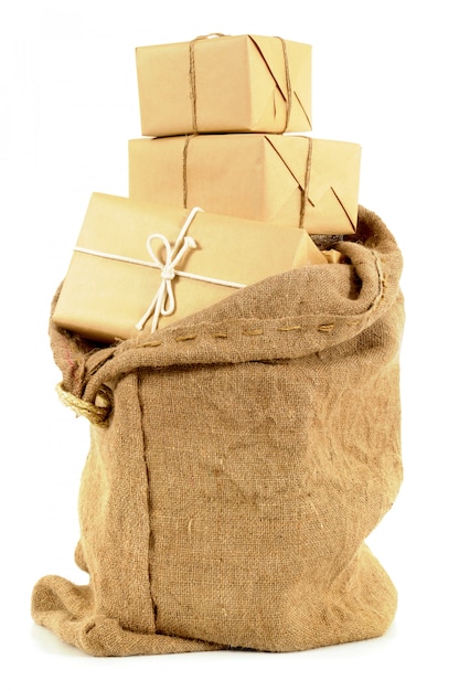 Mail bag filled with brown paper parcels