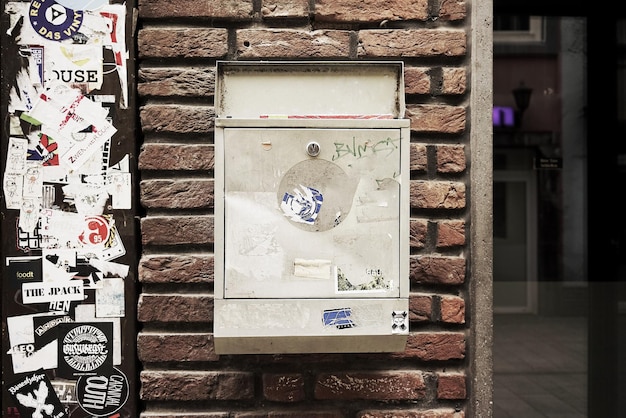 Photo mailbox on brick wall