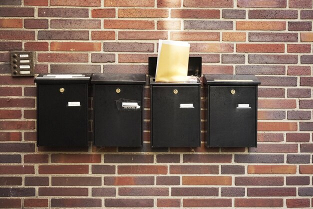 Photo mailboxes on wall