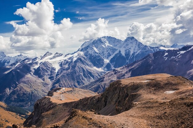 The main Caucasus range, mount Donguzorun and glacier Seven with mount Elbrus