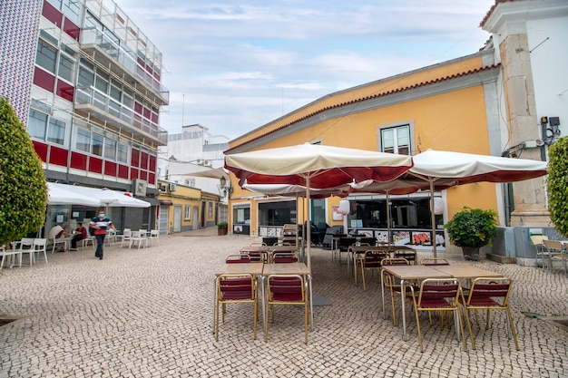 Main center downtown tourist shopping area in Faro city, Portugal.