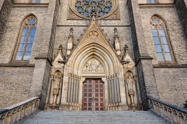 Main entrance to the church of St. Ludmila in Prague city. Historical landmark. Ancient gothic architecture in the capital of the Czech Republic.