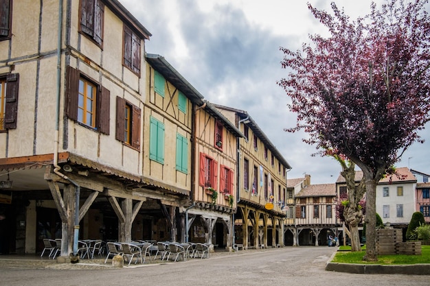 The main square of the medieval town of Mirepoix, with its half timbered houses, and its terraces