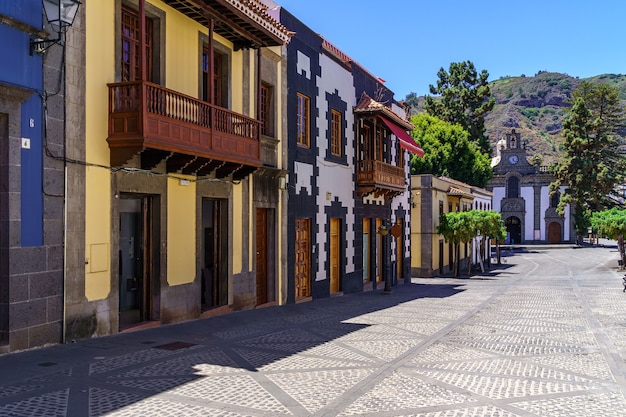 Main street of the charming town of Teror in Gran Canaria with colorful houses and church in the main square. Spain. Europe.