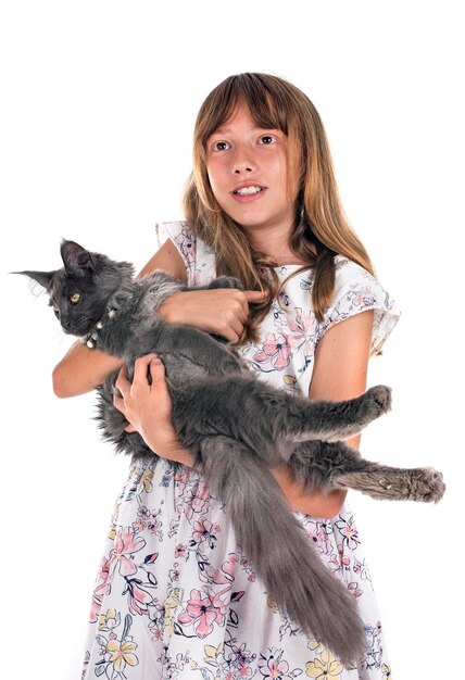 maine coon kitten and child in front of white background