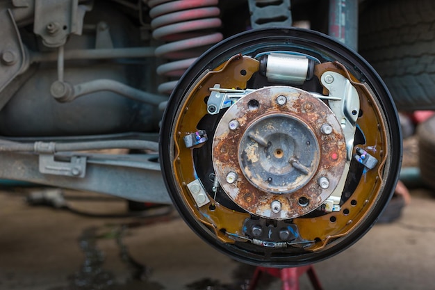 Photo maintenance repair and cleaning drum brake and asbestos brake pads it's part of car use for stop car