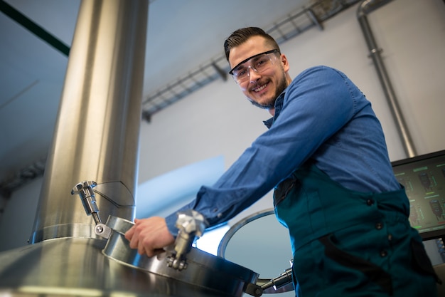 Maintenance worker working at brewery