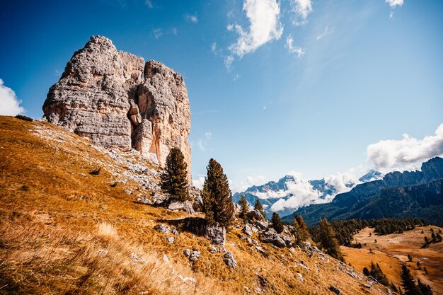 Majestic landscape of Alpine red autumn Cinque Torri Passo Falzarego Tofana Wonderful hiking nature scenery in dolomite italy near Cortina d'Ampezzo