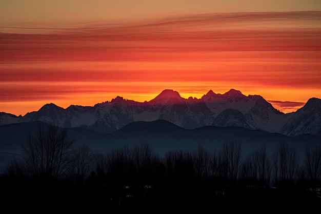 Foto maestosa catena montuosa con cielo al tramonto infuocato e cime stagliate create con intelligenza artificiale generativa