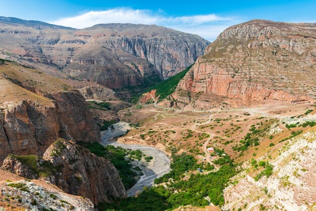 Majestic rocks and bfast river in valley