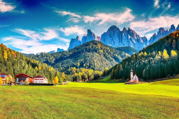 Majestic scenery in Dolomites with the St John's in Ranui Chapel