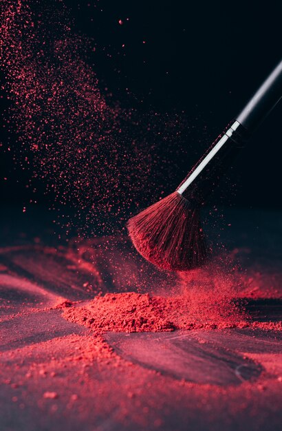 Make-up brush with powder explosion