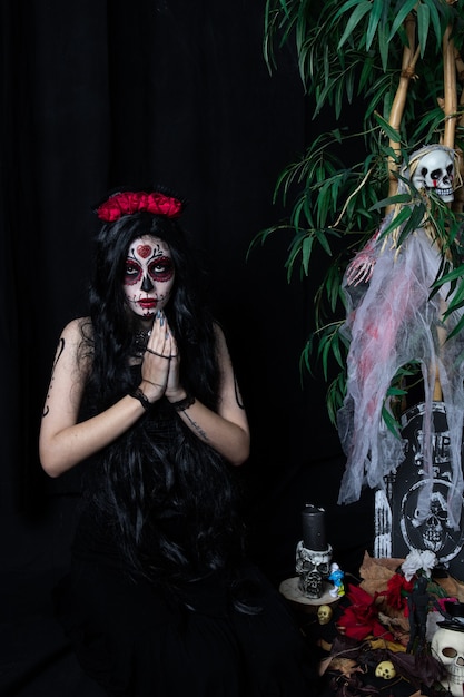 Make-up model with theme Mexican Day of the Dead in a study session in madrid, spain