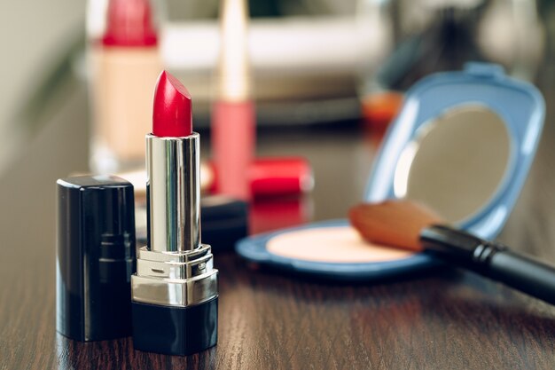 Make up products on vanity table close up