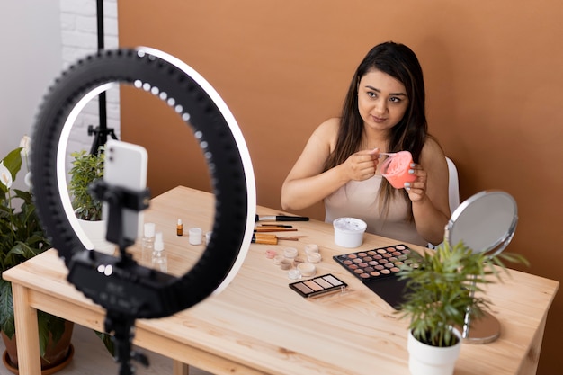 Photo makeup artist vlogging her tutorials