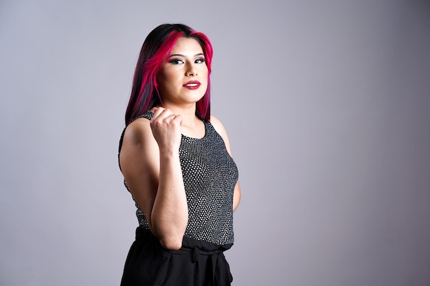 Makeup artist woman holding brushes on white background