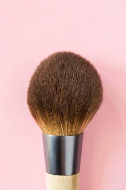 Makeup brush on pink