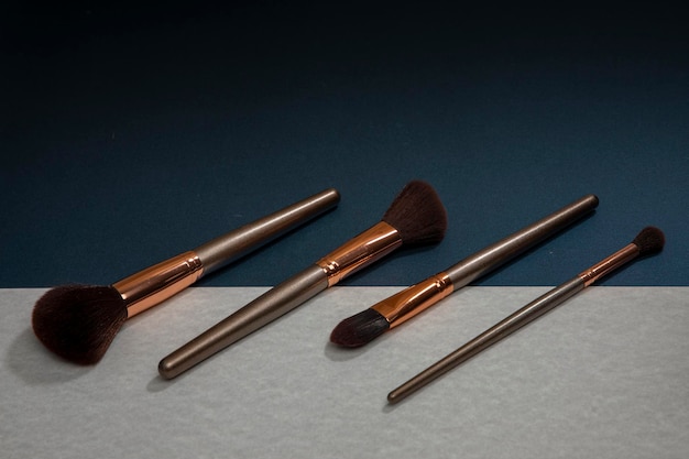 Makeup brush set with minimalist geometric shapes and copy space