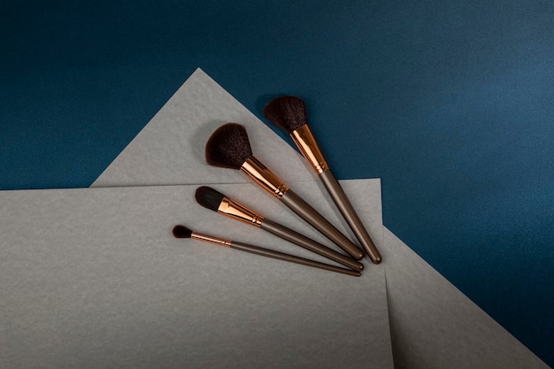 Makeup brush set with minimalist geometric shapes and copy space