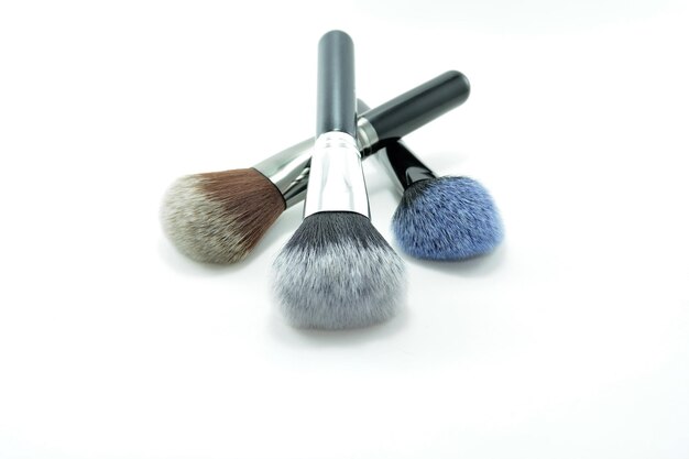 Makeup brushes on white background