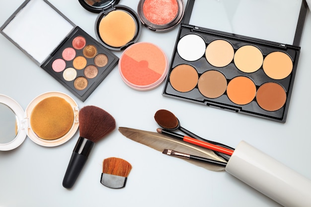 Makeup products on white