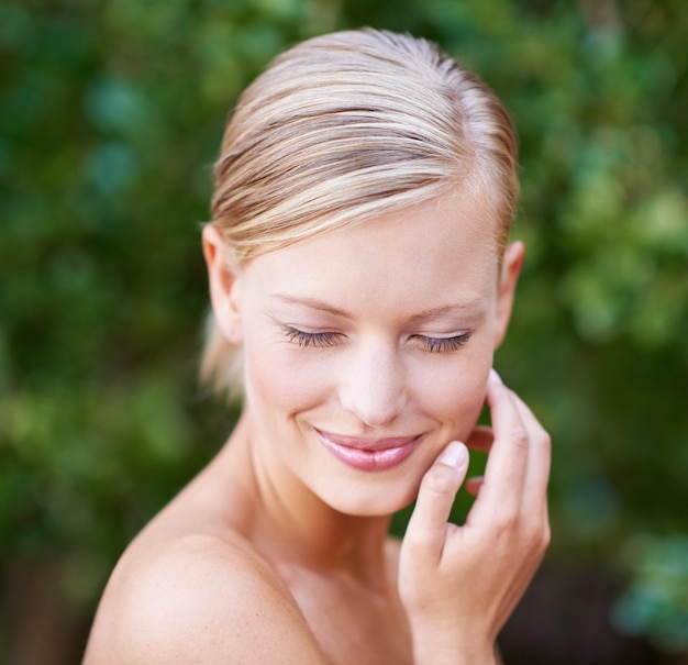 Makeup with face headshot of happy woman and skincare wellness or cosmetics in blurred background Dermatology or aesthetic young female model promoting self care and healthcare or beauty treatment