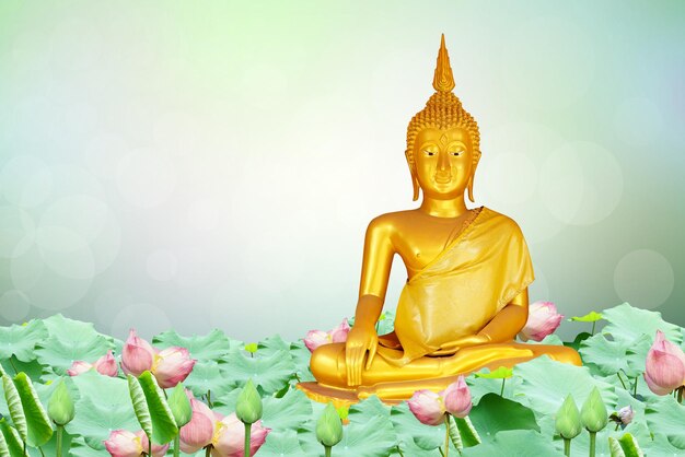 Фото Маха асанаха вишакха буча день изображение золотого будды фон из листьев бодхи с сияющим светом мягкое изображение и стиль плавного фокуса