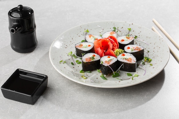 Maki rolls with salmon, cucumber, caviar and cheese.