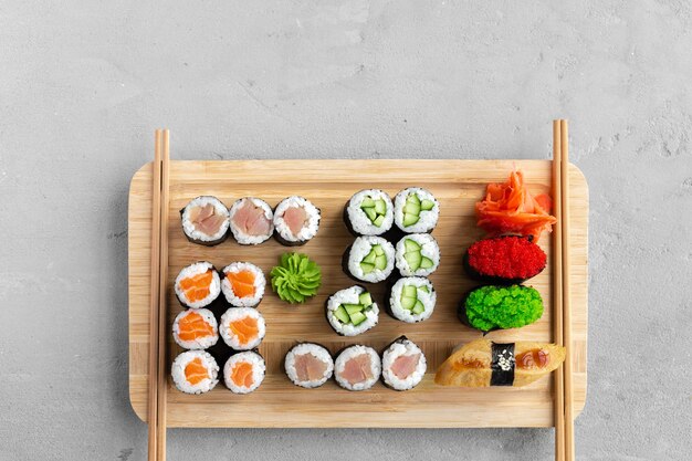 Maki sushi set served on wooden tray