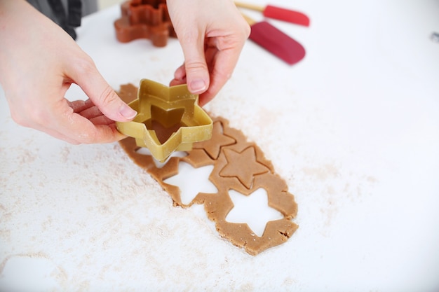 Photo making christmas gingerbread cookies