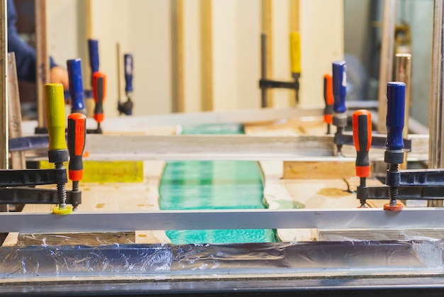 Making a dining table by oak and epoxy resin in the workshop