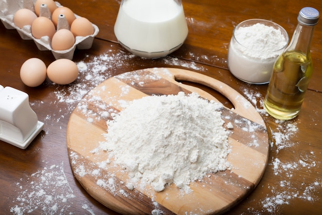 Making dough from eggs and milk.