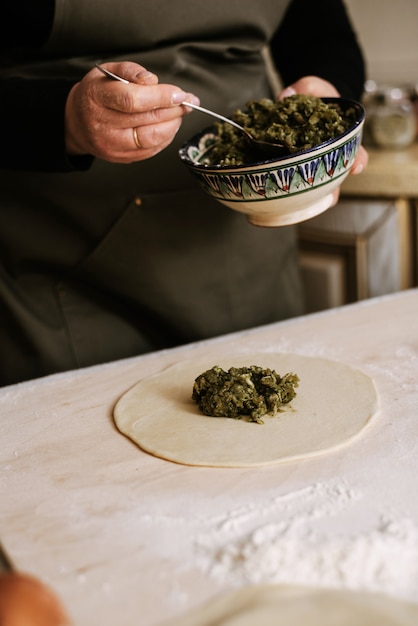 Making dumplings, manti and khinkali from minced beef, lamb and dough. homemade food