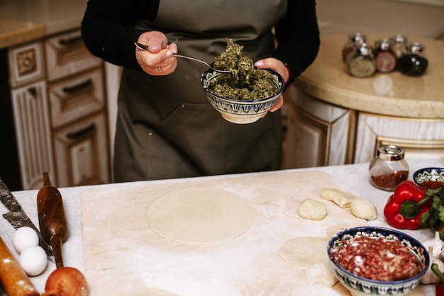 Making dumplings, manti and khinkali from minced beef, lamb and dough. homemade food