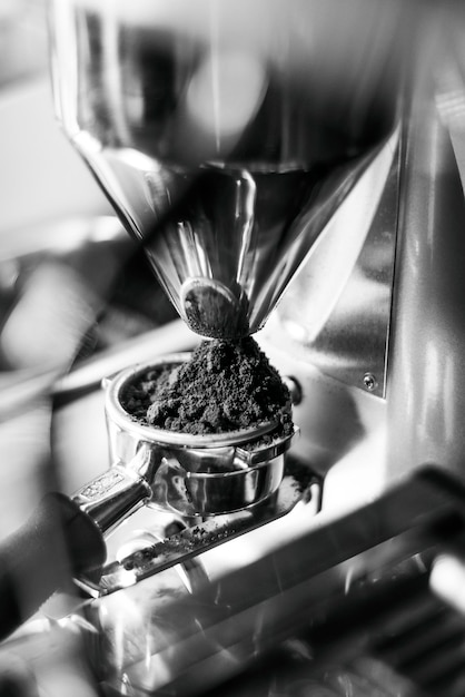 Photo making espresso coffee close up detail with modern machine