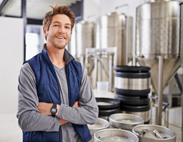 making a fine brew portrait of a man working in a microbrewery