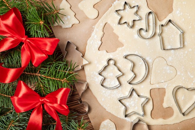 Making gingerbread Christmas Cookies Using form for cooking