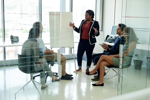 Making a good business great Shot of a group of colleagues brainstorming in an office