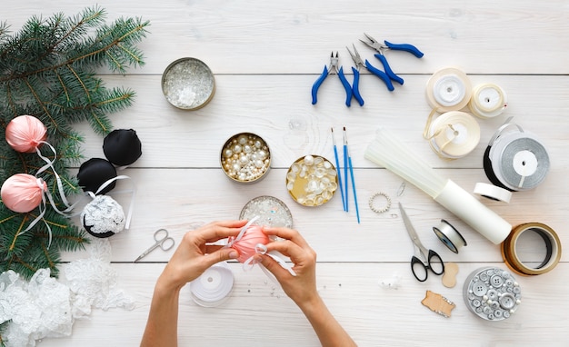 Making handmade christmas balls, tools for creating holiday decorations