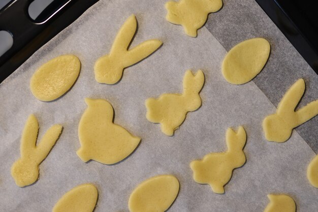 Making homemade cookies, curly homemade cookies for Easter