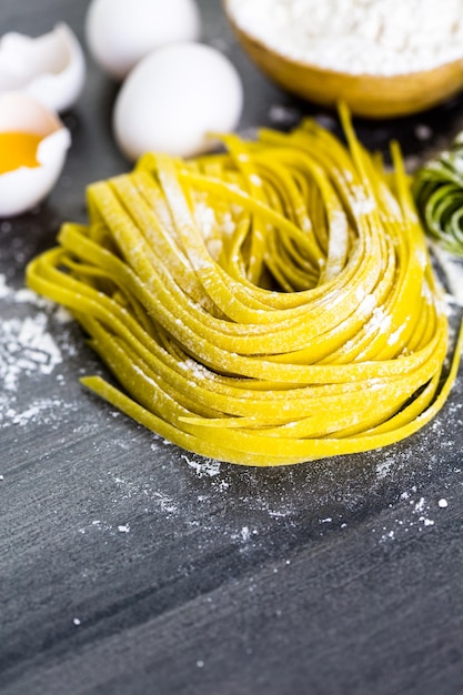 Making homemade Fettuccine pasta with farm fresh produce.