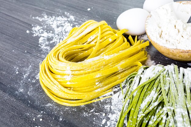 Making homemade linguine pasta with farm fresh produce.