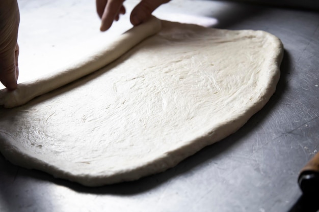 Making a loaf in a bakery by hand