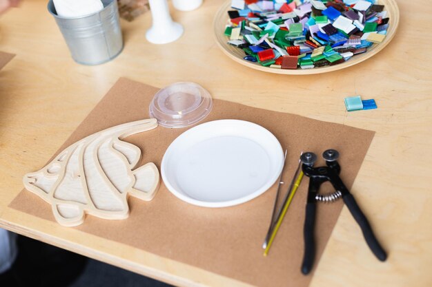 Making mosaics from colored glass. Step 1.
