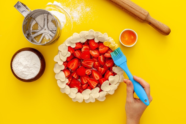 Making strawberry pie.