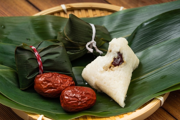 Making zongzi, a special food for the chinese traditional\
festival dragon boat festival