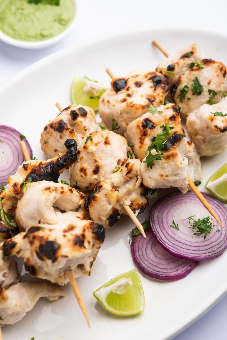 Photo malai chicken tikka or murgh malai is a mouthwatering juicy grilled chicken recipe