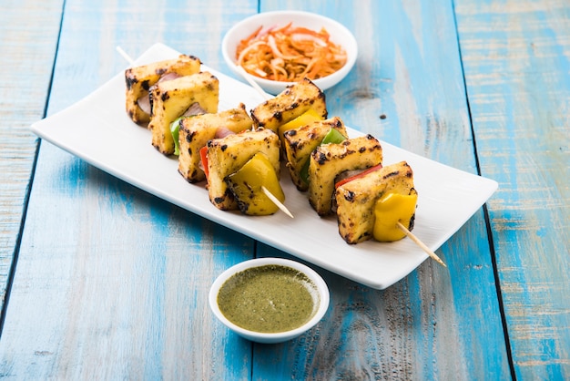 Malai Paneer Tikka Kabab is an Indian dish made from chunks of cottage cheese marinated in spices