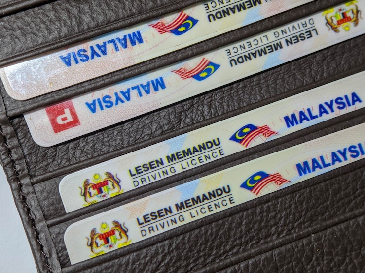 Photo malaysia driving license on brown wallet