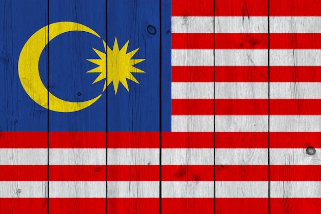 Malaysia flag painted on old wood plank